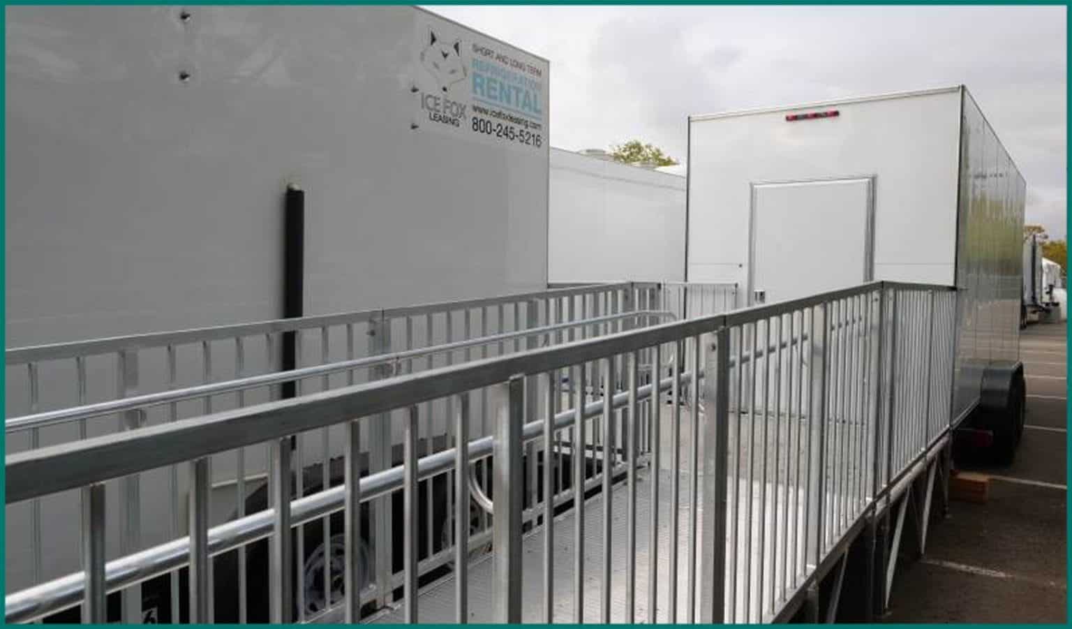 Exterior of a mobile refrigeration unit with a long metal access ramp